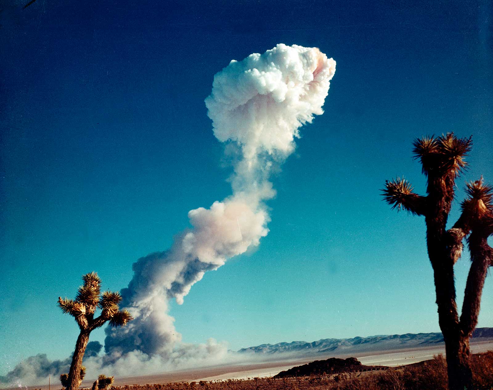 The mushroom cloud forming at the Nevada Test Site.